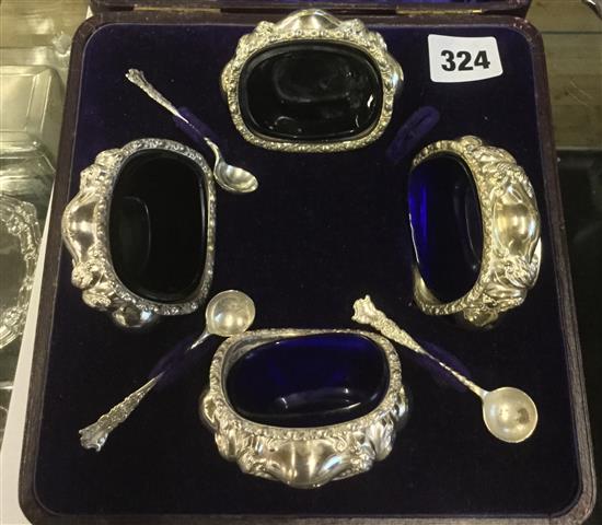 Cased set of four Edwardian silver salts and three spoons